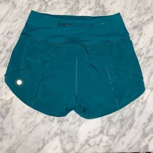 Size 4 teal speed up shorts 4 inch inseam